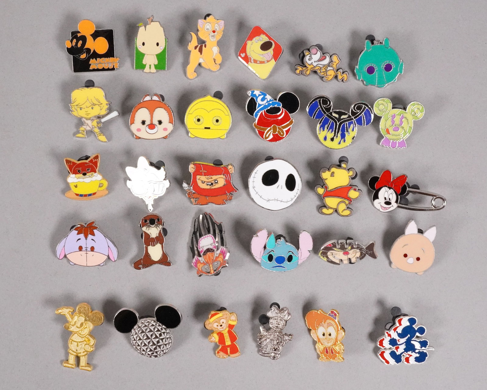 Lots Disney pins: Lots Disney pins.
