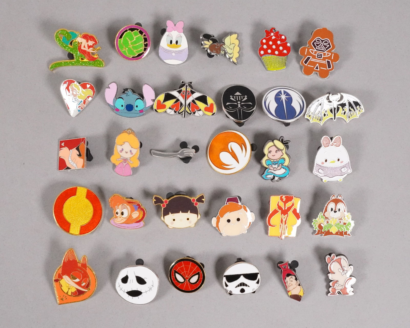 Lots Disney pins: Lots Disney pins.