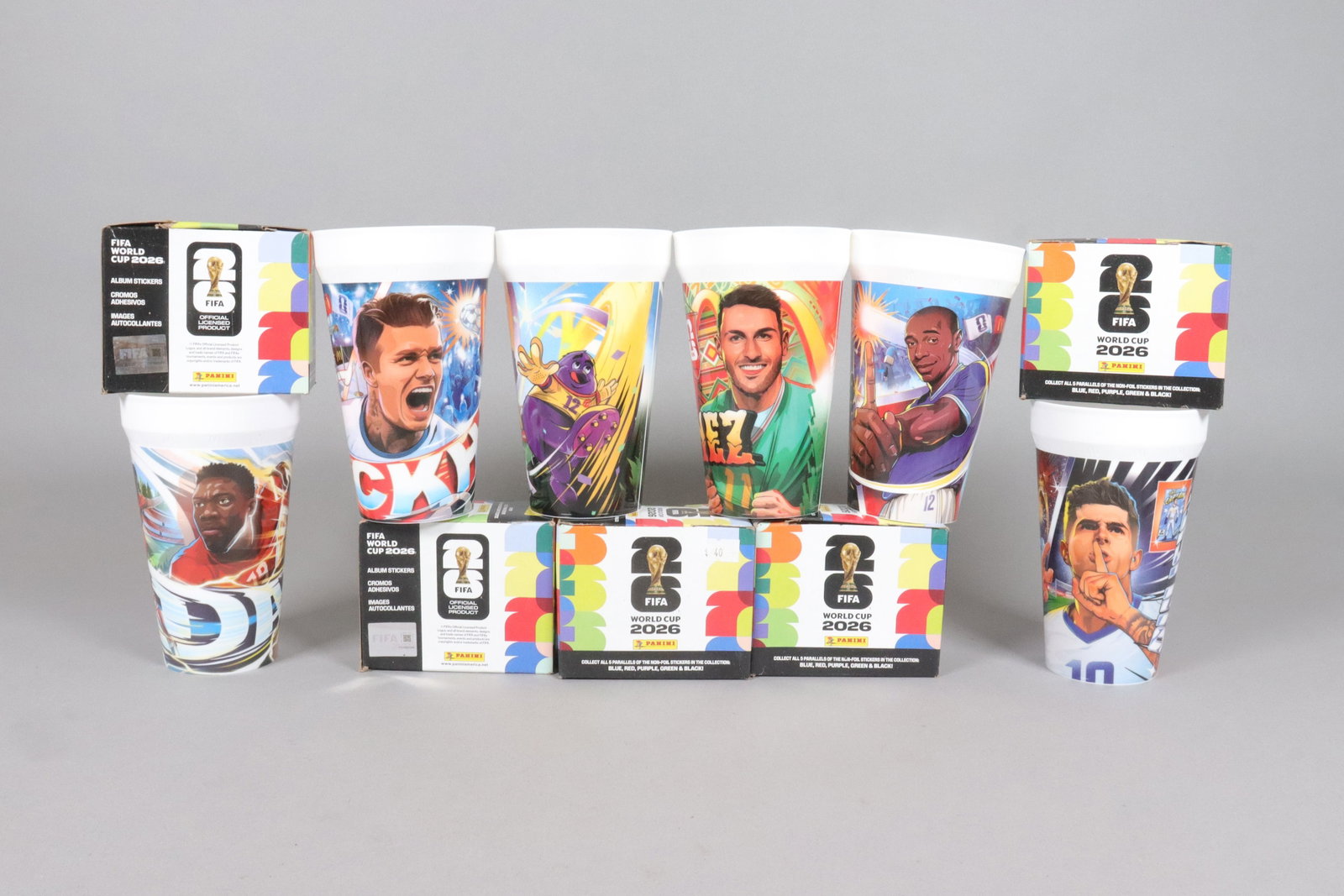 Lots FIFA World Cup items and stickers: Lots FIFA World Cup items, and sealed packs Panini 2026 FIFA stickers in boxes.