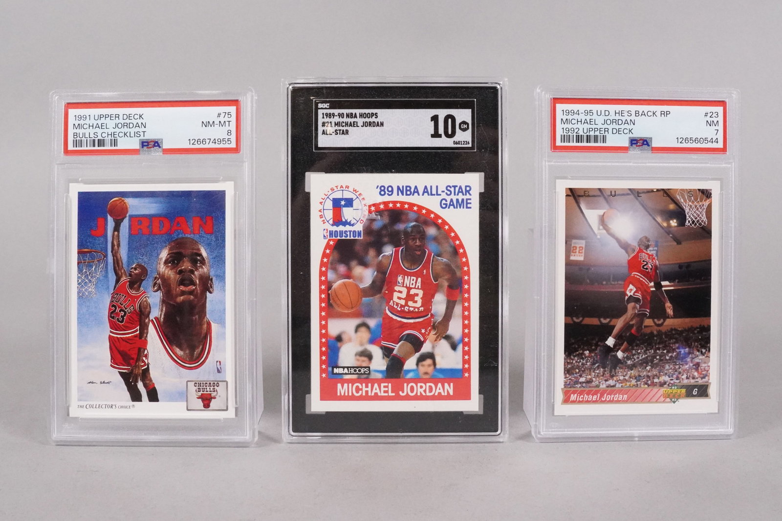 3 Michael Jordan cards PSA: 3 Michael Jordan cards, all graded.