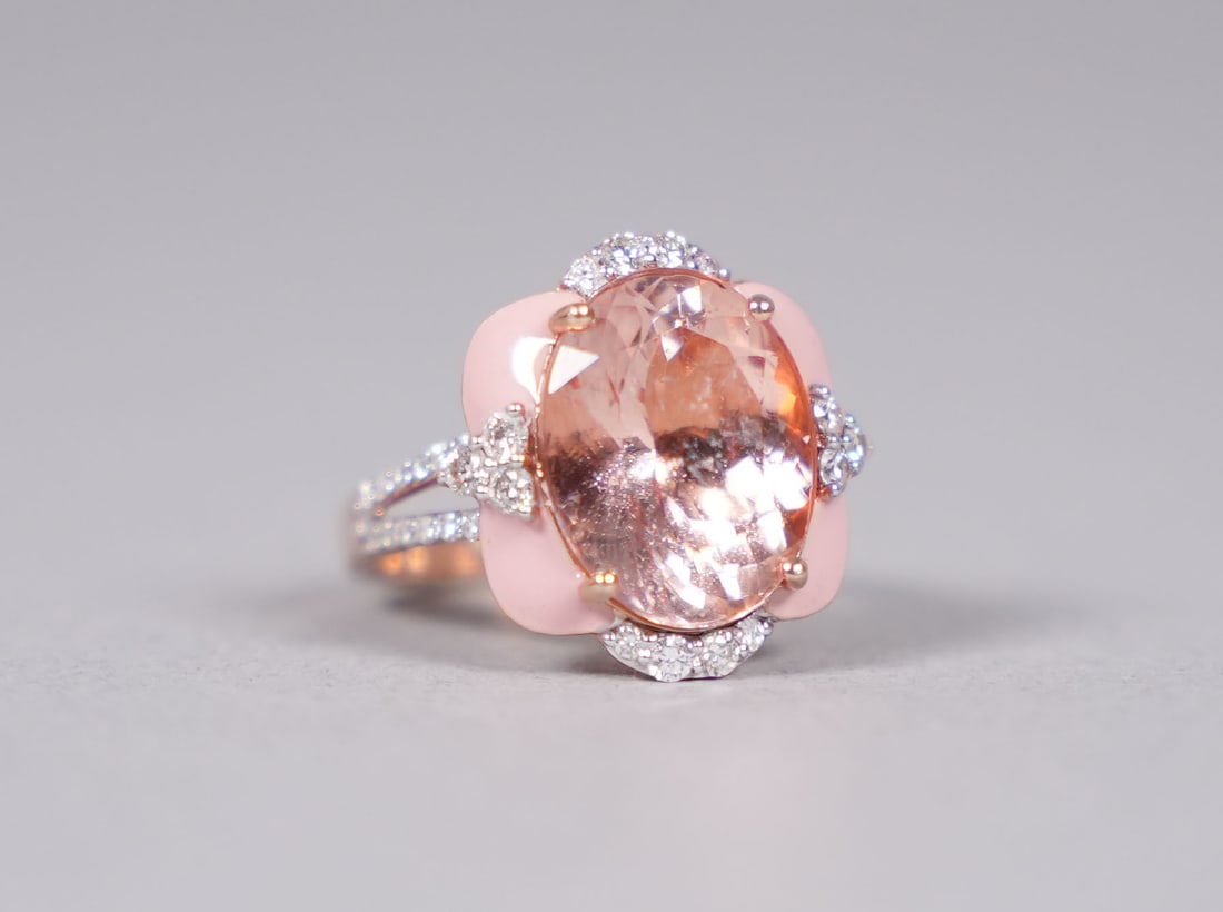14 kt two tone gold morganite diamond ring: 14 kt two tone gold natural morganite and diamond ring. Total 7.22 carats natural morganite and total 0.52 carats natural diamonds. US ring size 6.75.