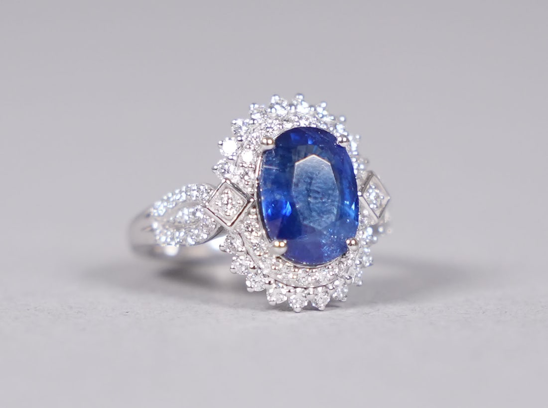 Platinum natural blue sapphire diamond ring GIA: Platinum natural sapphire and diamond ring. Comes with GIA certificate. Total 3.52 carats natural sapphire, and total 0.78 carats natural diamonds. US ring size 6.75.