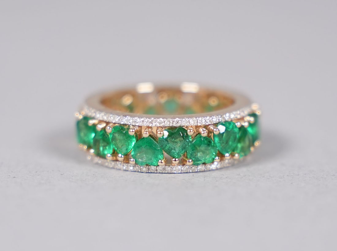 14 kt y/g natural emerald diamond ring: 14 kt yellow gold natural emerald and diamond ring. Total 4.42 carats heart shaped emerald, and total 0.51 carats natural diamonds. US ring size 7.