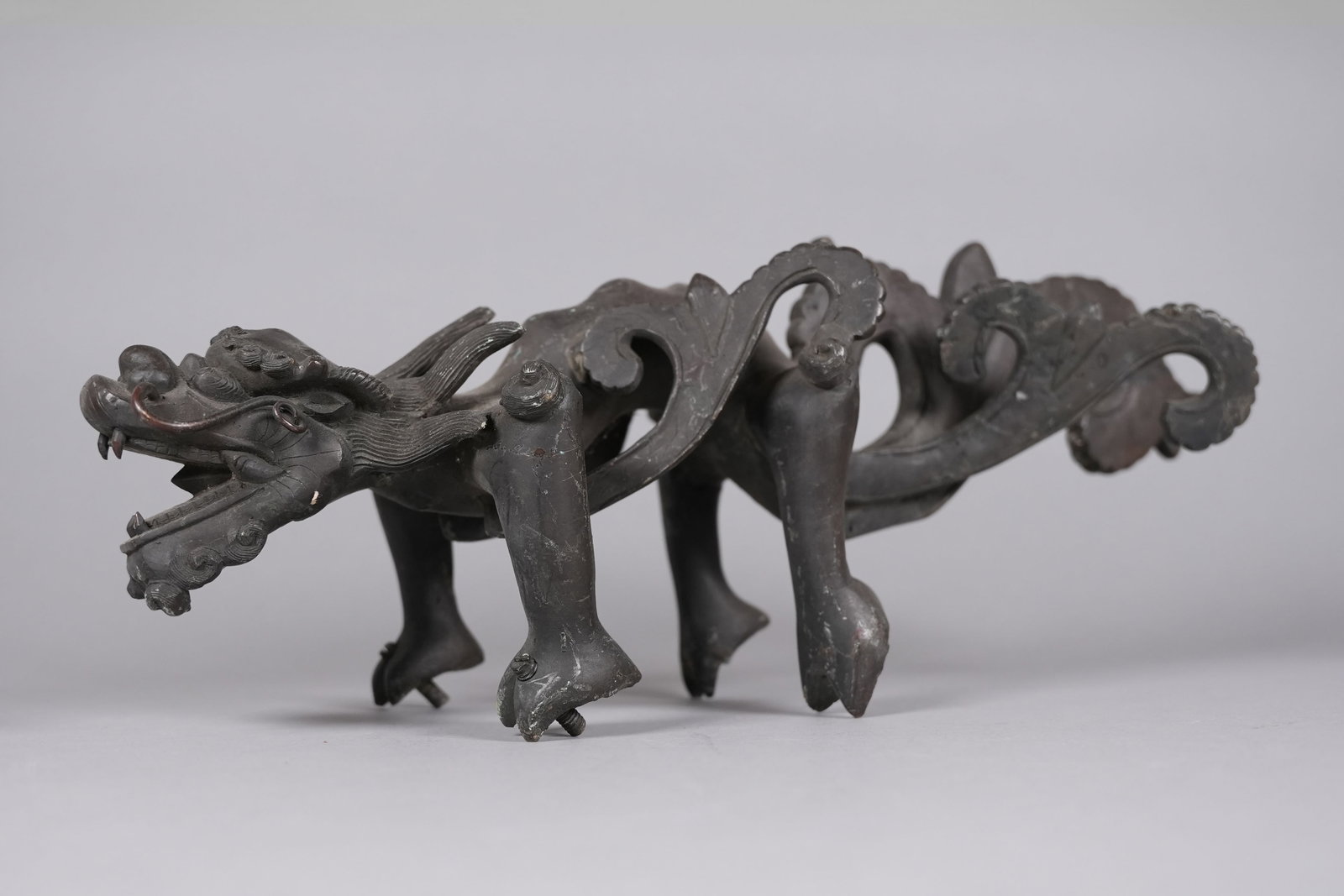 Chinese antique heavy dragon: Chinese antique heavy dragon. H: 7" x W: 18."
