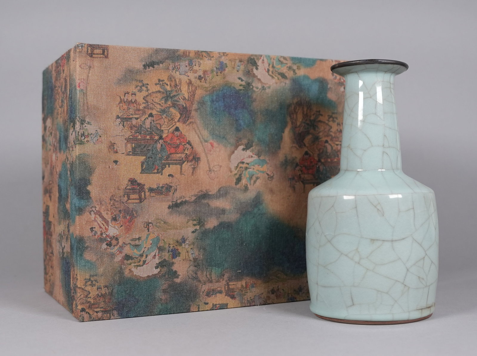 Chinese fine crackled vase with box: Chinese fine crackled vase with silk box. H: 9" x W: 4.6."