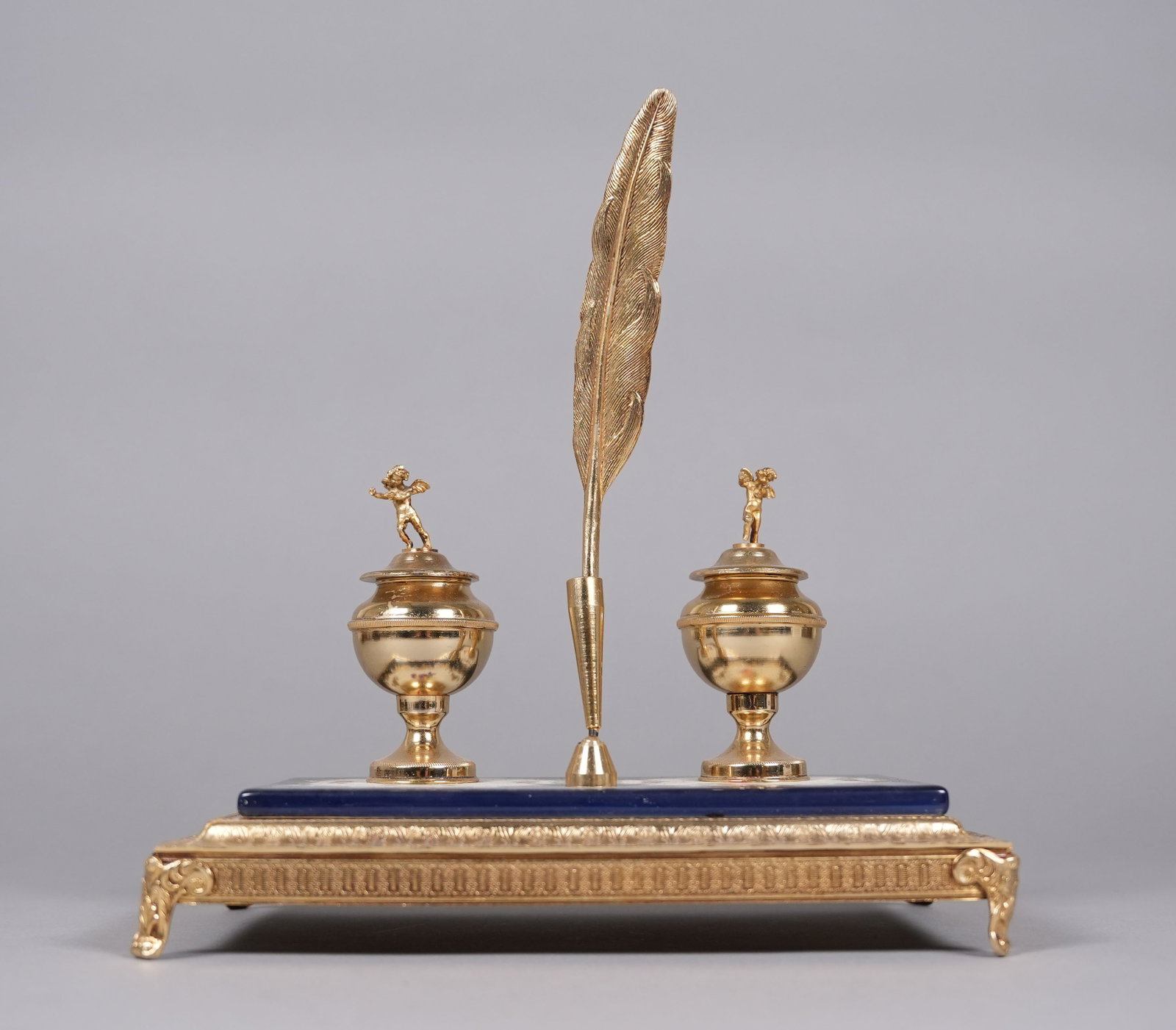 A vintage pen holder: A vintage pen holder. H: 5.6" x W: 9."
