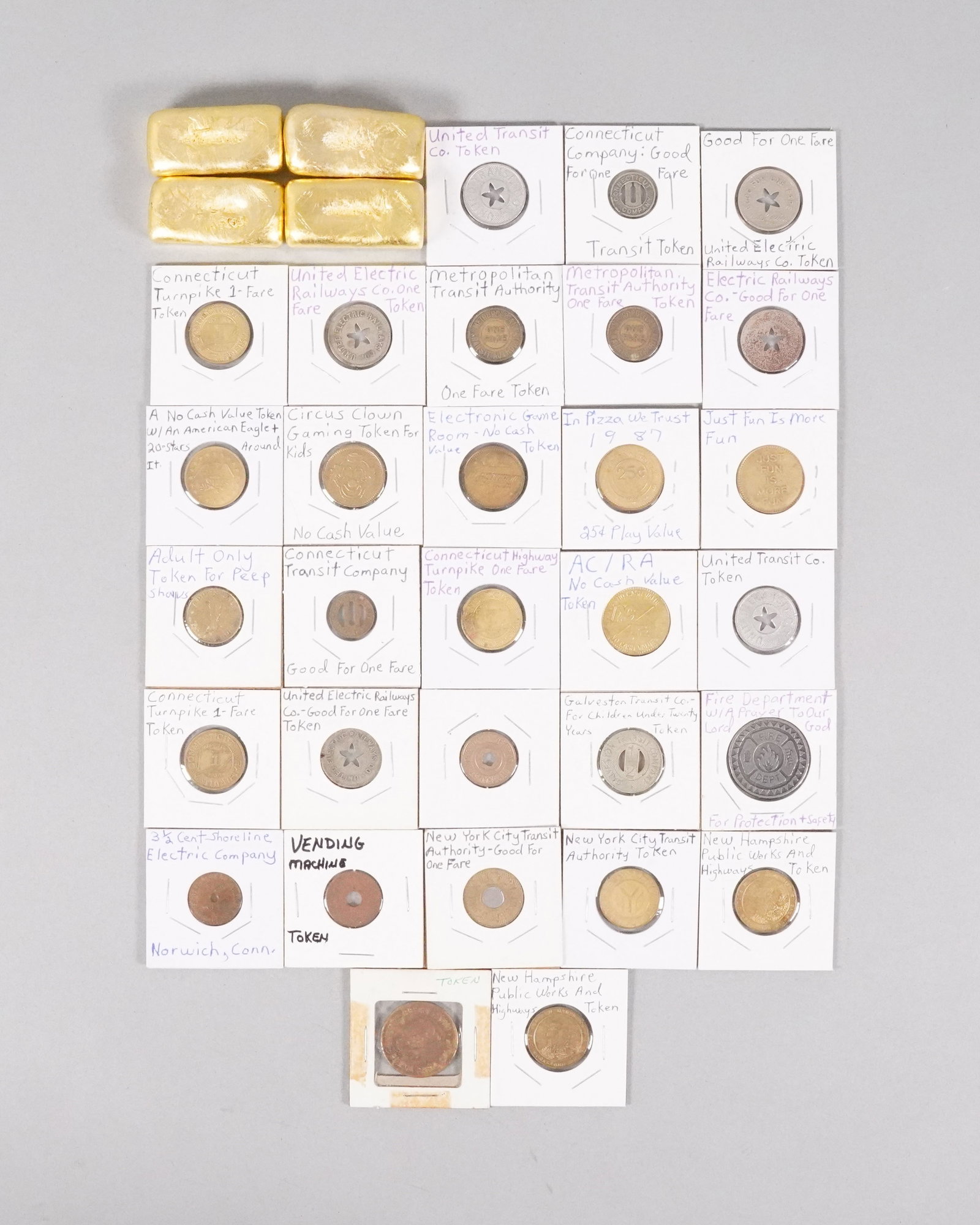 Lots ingots and tokens: Lots ingots and tokens, condition selling it as is, all sales are final. No return.