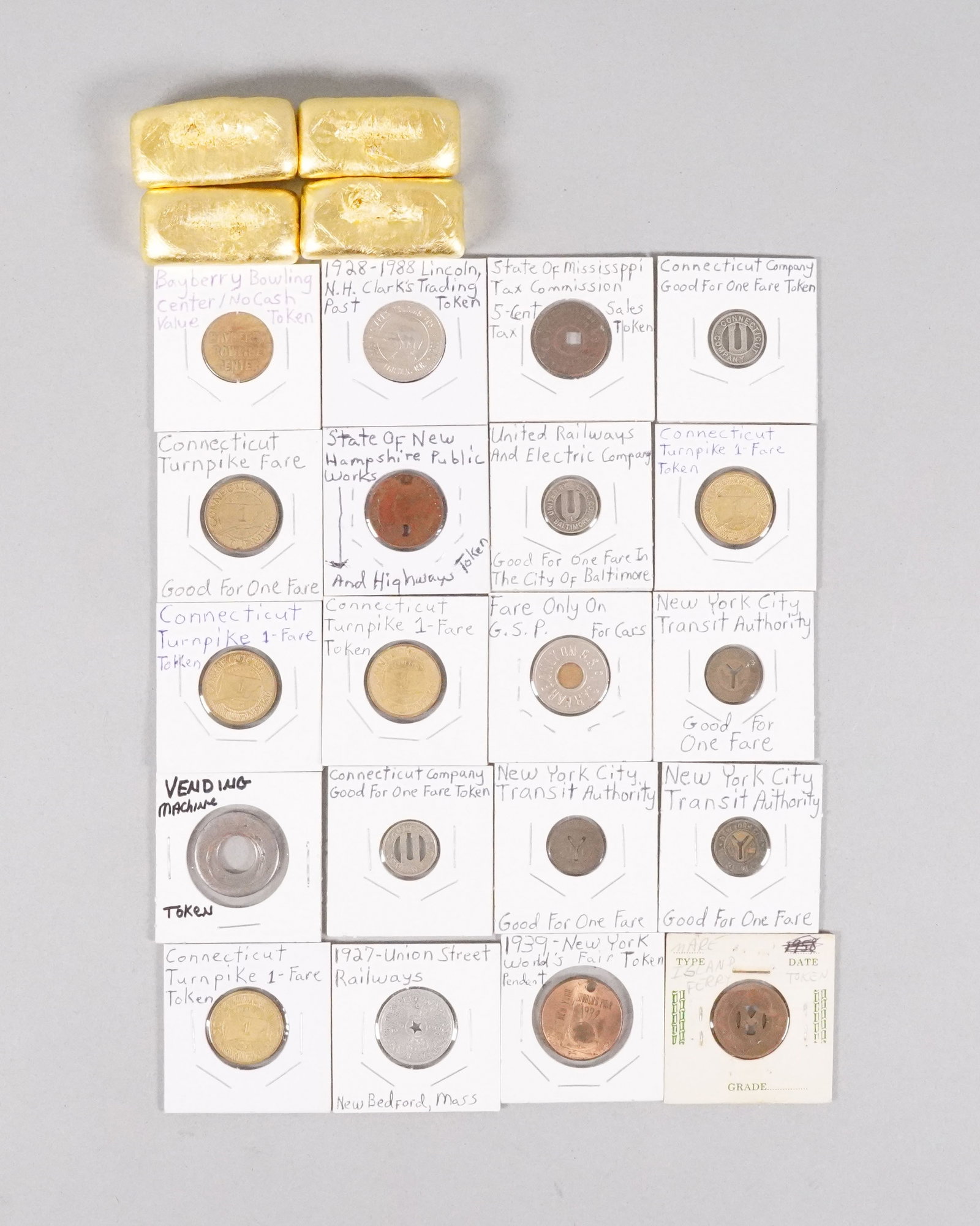 Lots ingots and tokens: Lots ingots and tokens, condition selling it as is, all sales are final. No return.