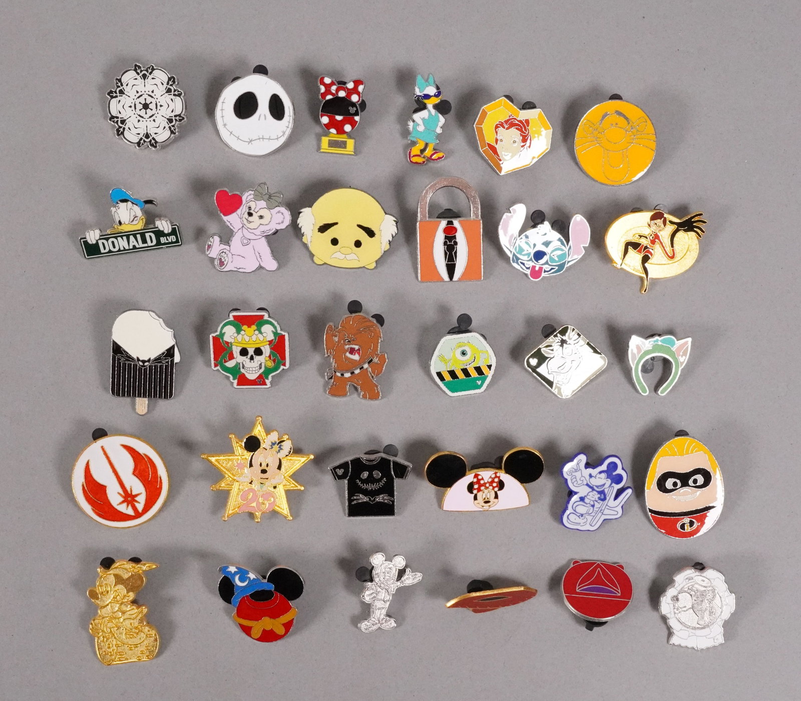 Lots Disney pins: Lots Disney pins.