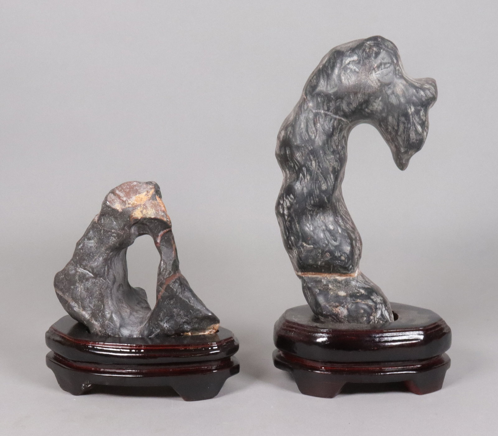 Lots Chinese stone boulders: Lots Chinese stone boulders, with wooden stand.