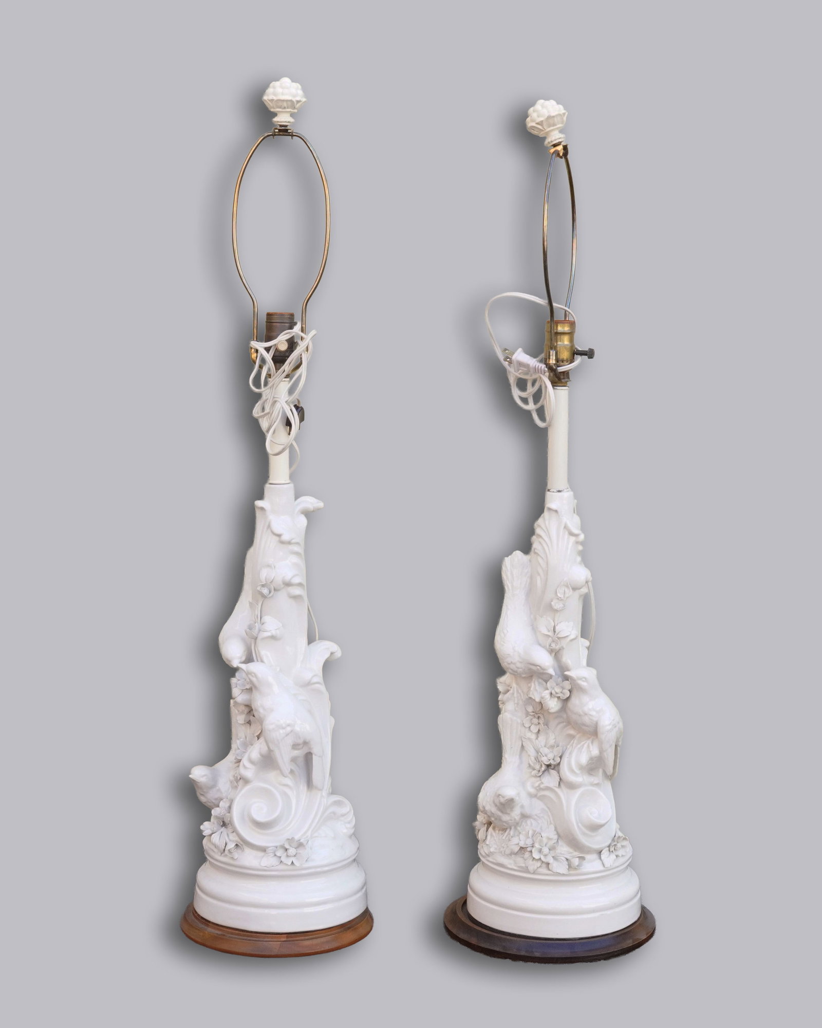 2 vintage figurine lamp stand: 2 vintage figurine, lamp stand. H: 36" x W: 8."
