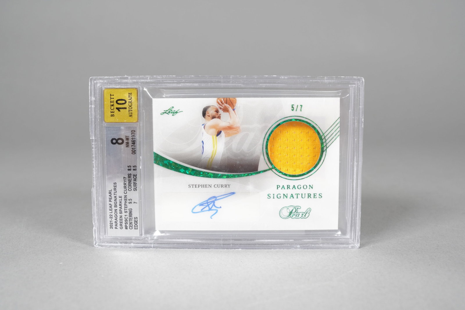 Steph Curry jersery signed card 5/7 rare: Steph Curry jersey and signed card, Beckett 10 autograph, 5/7, a rare signed card.