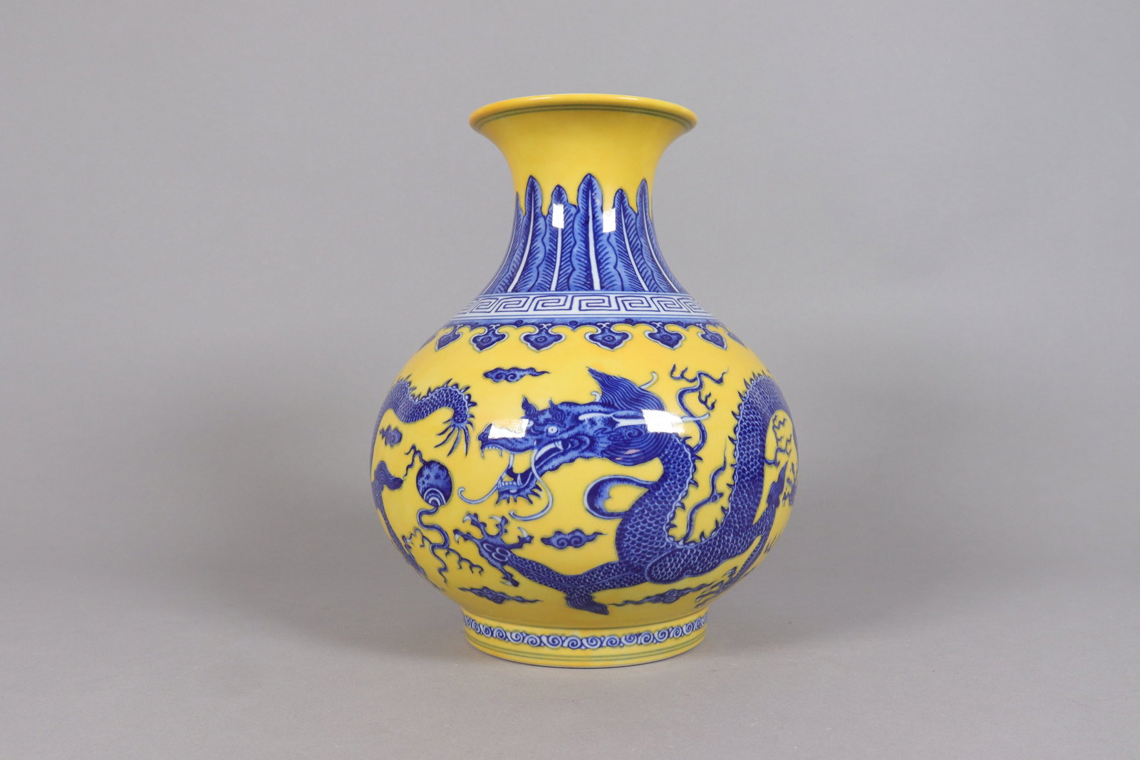 Chinese fine yellow dragon vase: Chinese fine yellow dragon vase. H: 10.75" x W: 8."