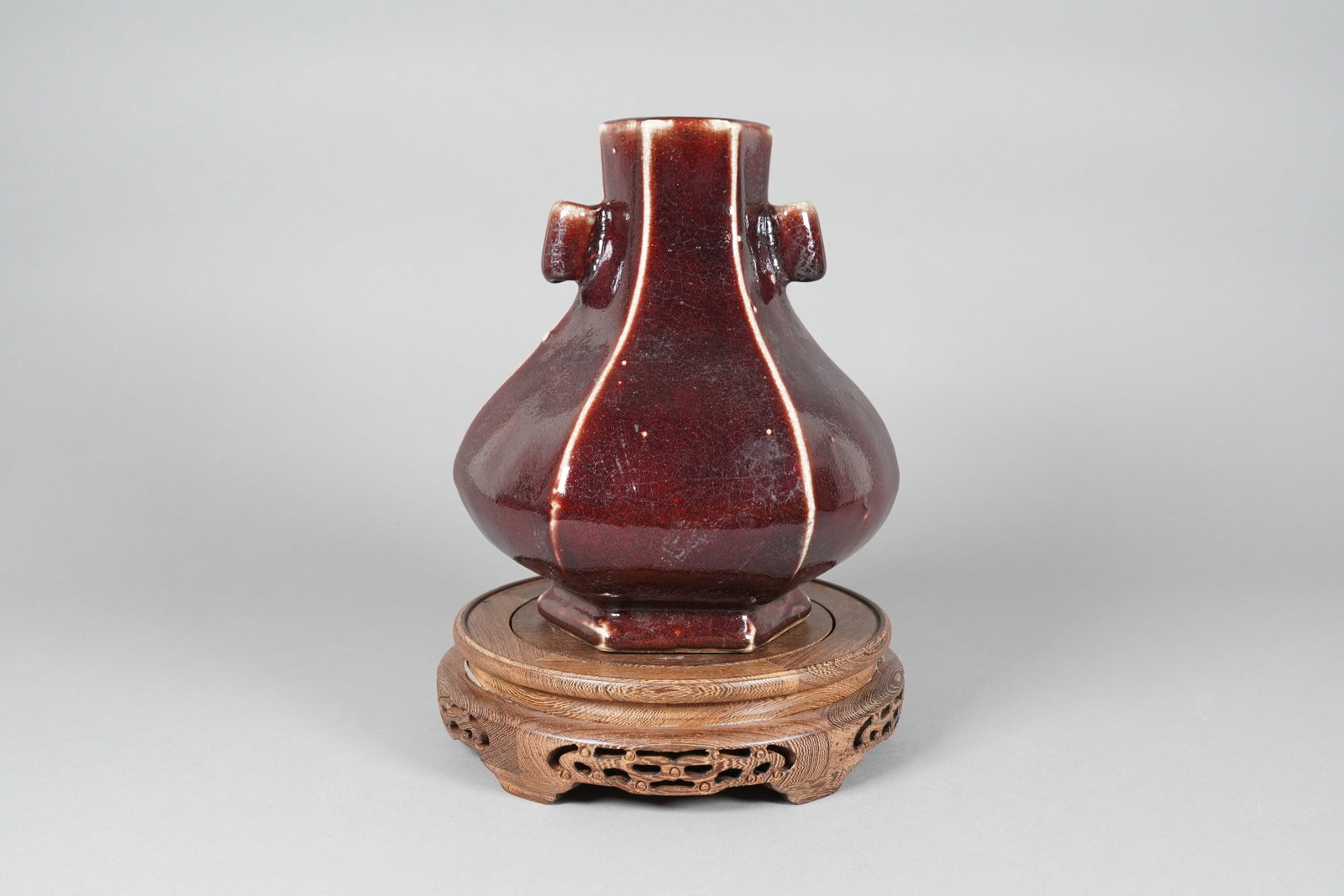 Chinese fine handled red heavy vase: Chinese fine handled red heavy vase. H: 10" x W: 8.2."