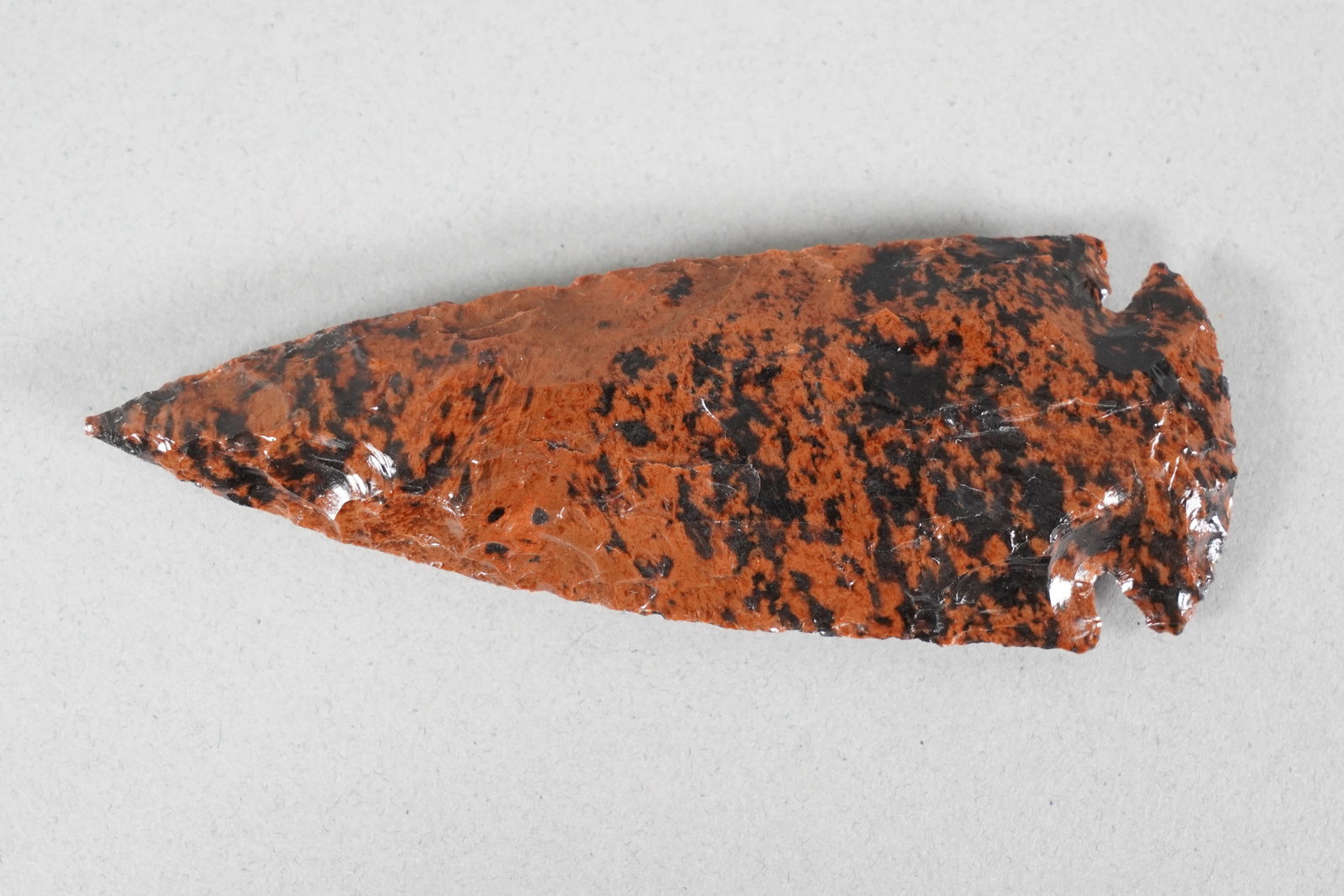 An estate obsidian spearhead: An estate obsidian speaerhead. L: 3.5" x W: 1.5."
