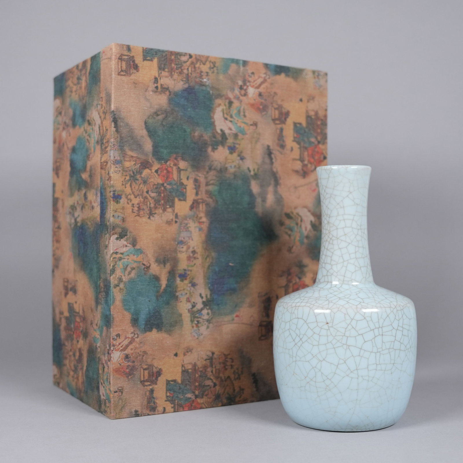 Chinese fine celadon vase with box: Chinese fine celadon vase with heavy silk box. H: 9" x W: 4.8."