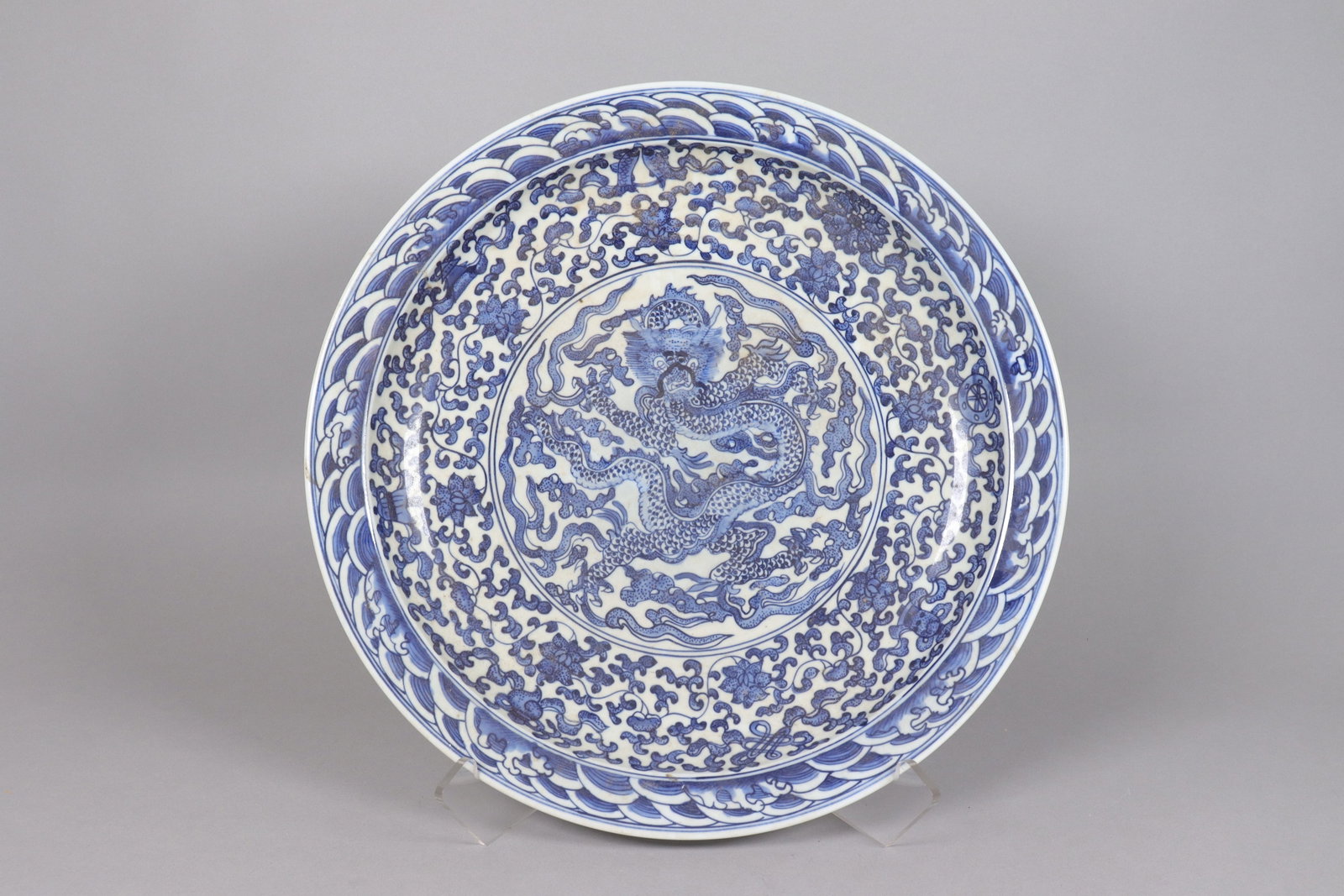 Chinese fine b/w dragon charger: Chinese fine b/w dragon charger plate. H: 2.75" x W: 17.5."