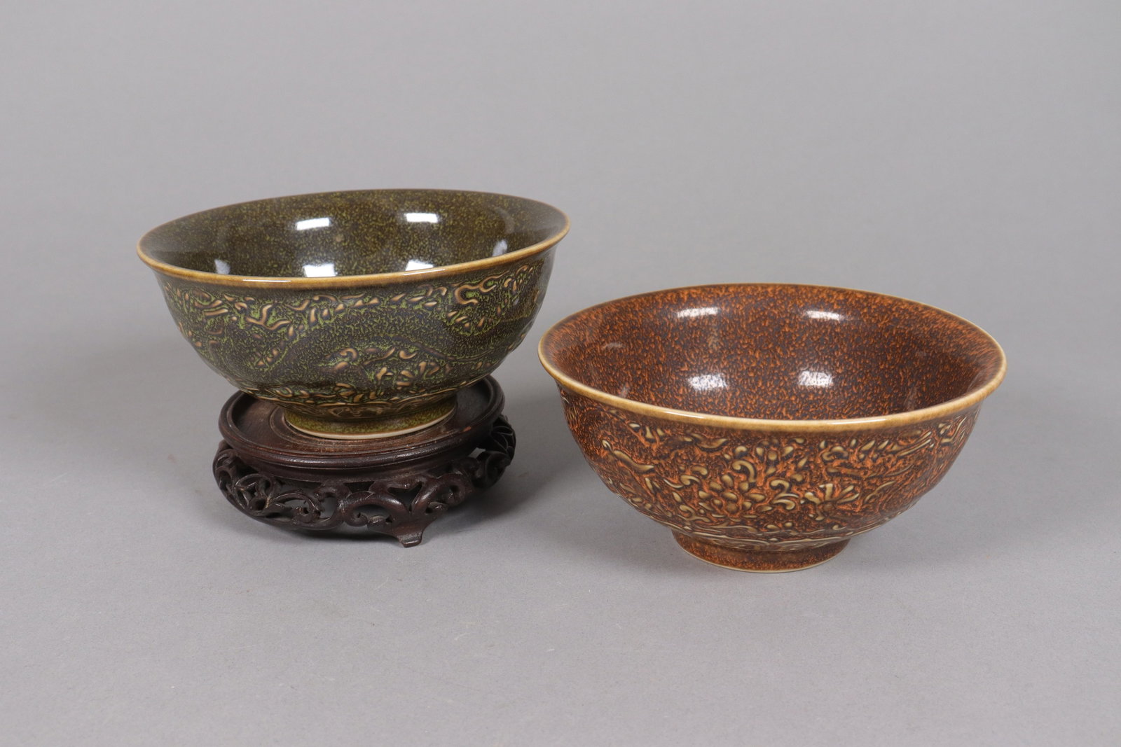 2 Chinese large carved bowls: 2 Chinese large carved bowls. Largest H: 3" x W: 6."