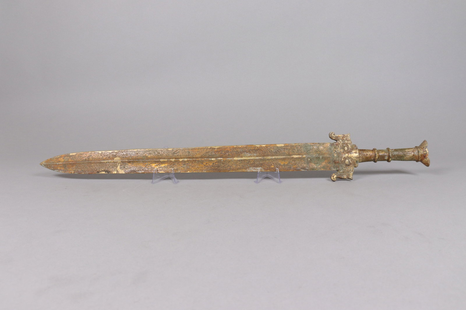 Chinese long bronze sword: Chinese long bronze sword. L: 25" x W: 2.9."