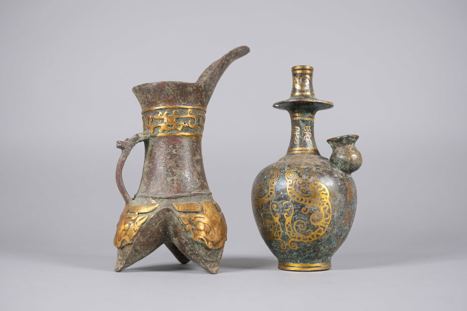 2 Chinese gilted bronze vessels: 2 Chinese fine gilted bronze vessels. Largest H: 8.2" x W: 5.9."