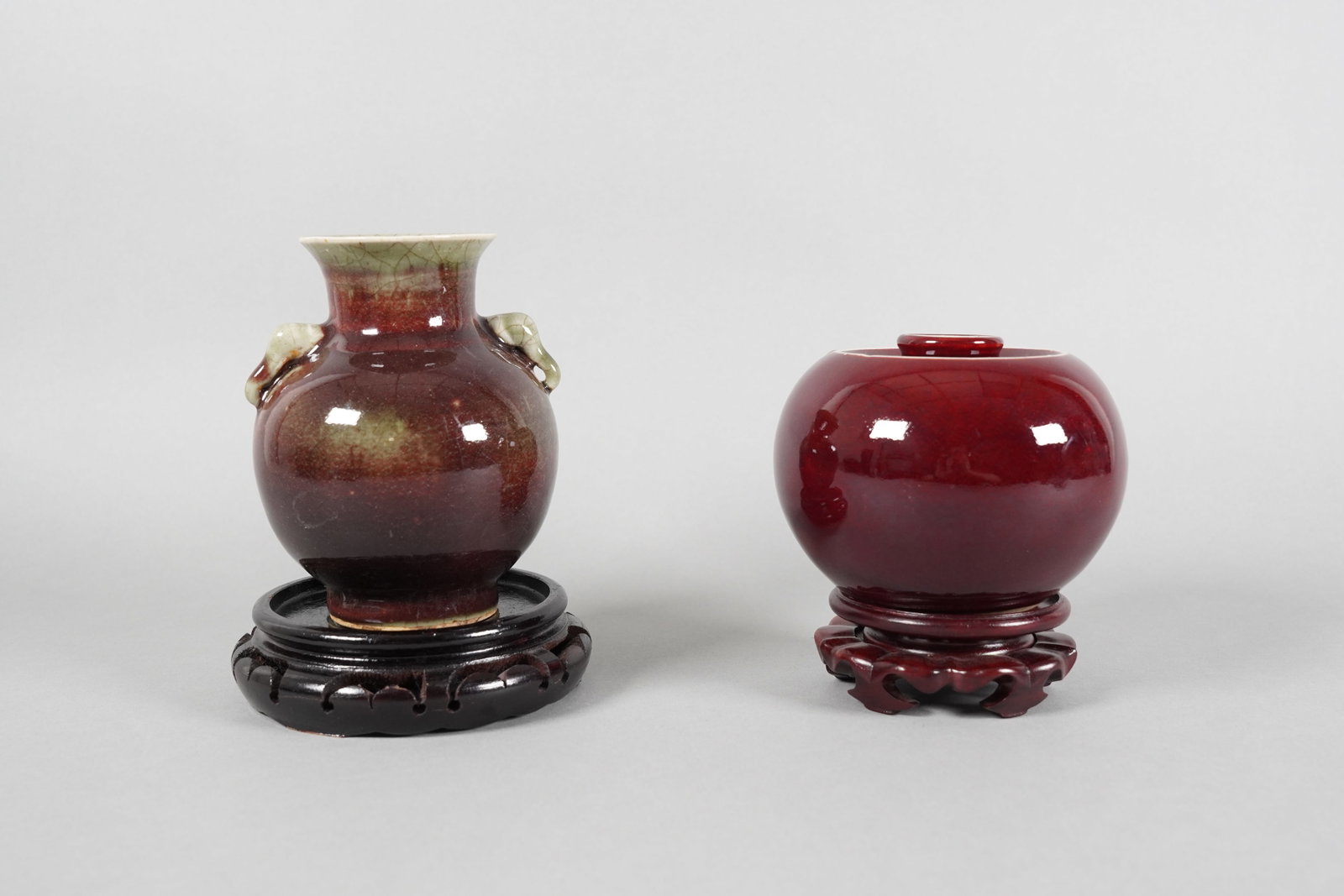 2 Chinese red porcelains: 2 Chinese red porcelains, largest H: 5.6" x W: 4.5."