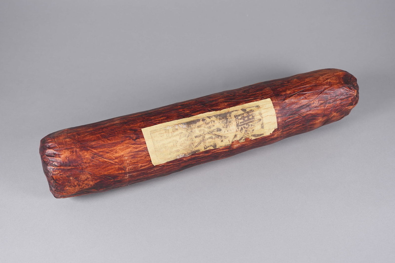 Chinese long tube of tea: Chinese long tube of tea, in a roll. L: 24" x W: 5."