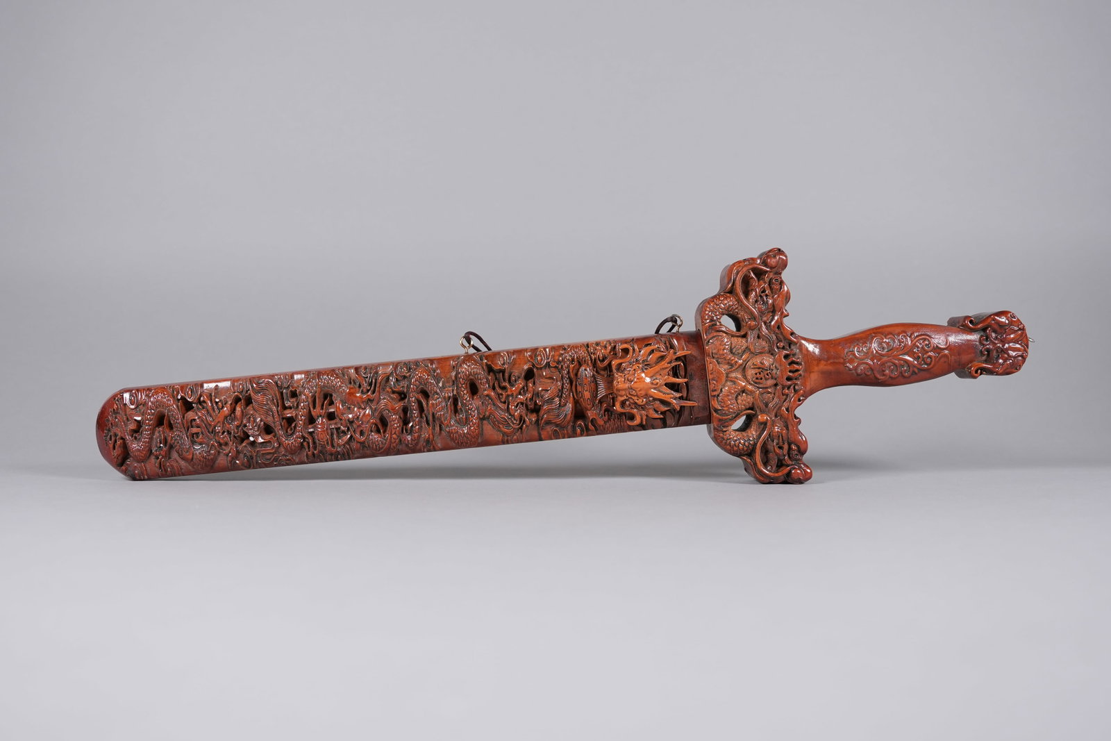 Chinese fine wooden carved sword: Chinese fine wooden carved sword. L: 23.6" x W: 6."