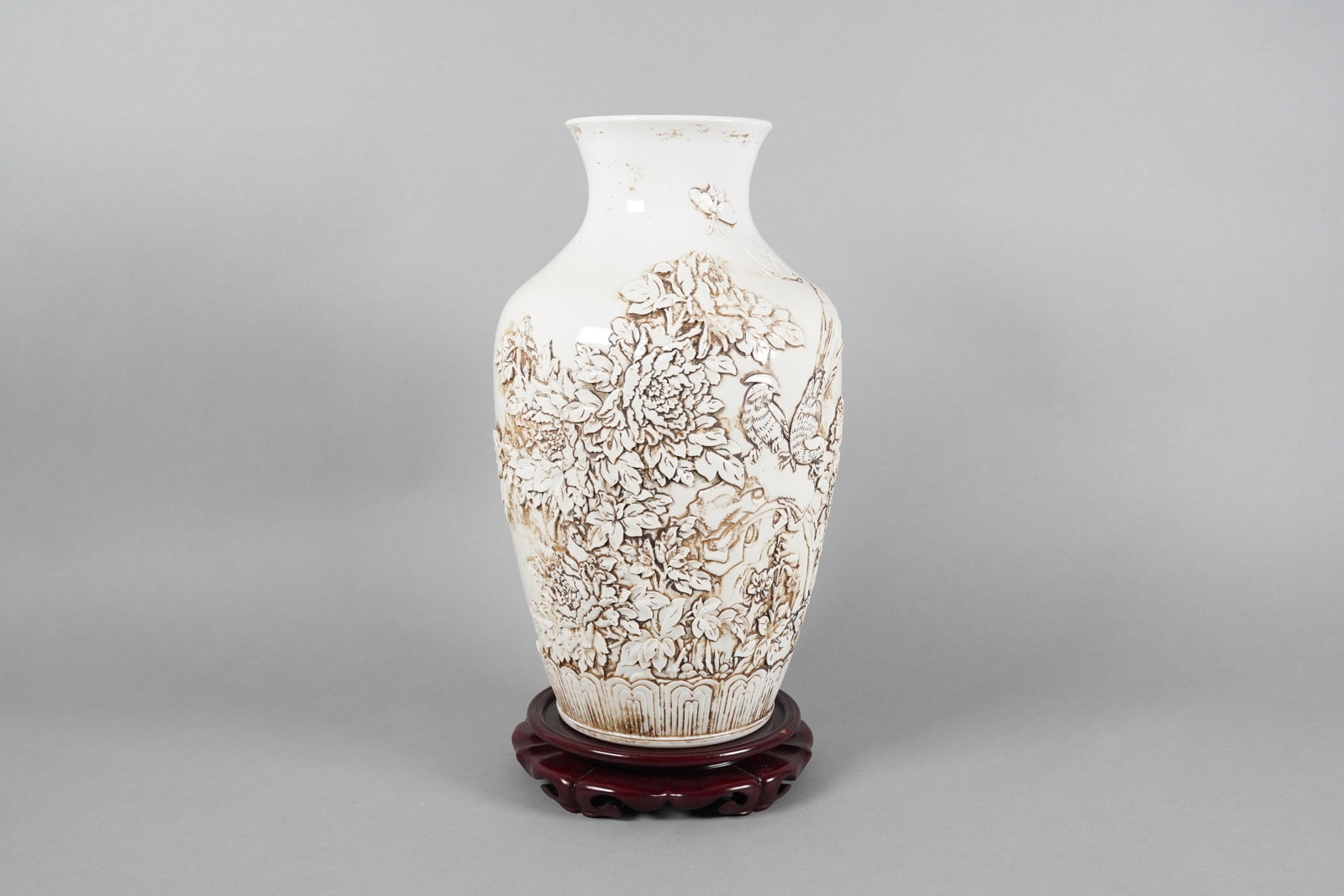 Chinese tall carved white vase: Chinese tall carved white vase. H: 13.7" x W: 10.2."