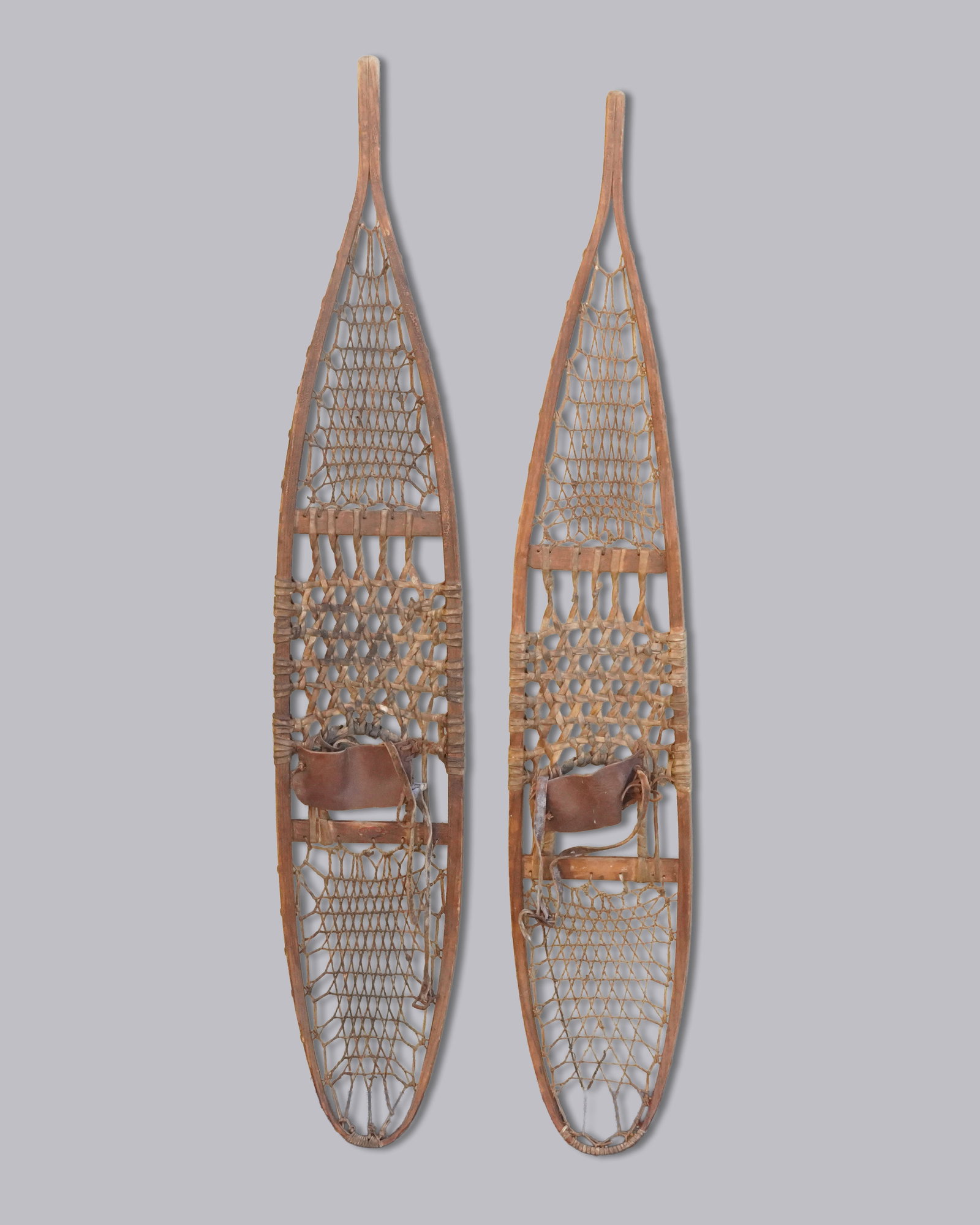 2 antique New Guinea snow shoes: 2 antique New Guinea snow shoes, dated 1942.