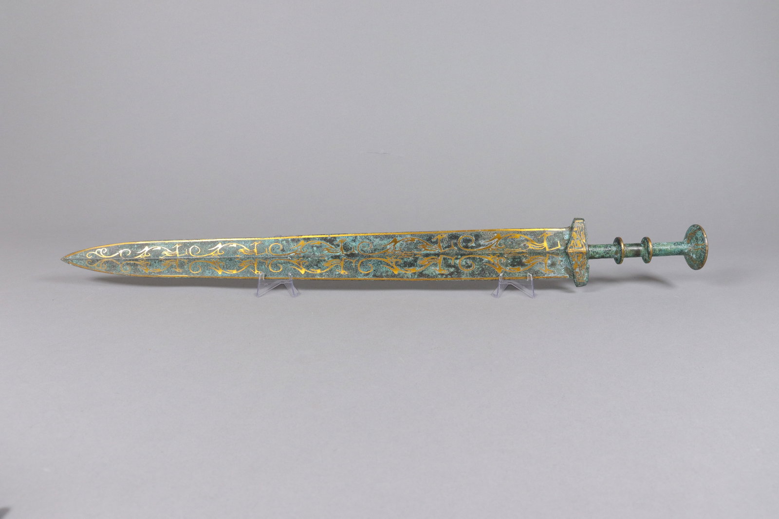 Chinese long gilted bronze sword: Chinese long gilted bronze sword. L: 24.85" x W: 3.1."