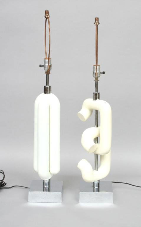 Pair Modern Sonneman Table Lamps: Robert Sonneman, each of tubular form, enameled white, raised above white metal bases. 34"H (base to top of finial). Condition: very good, no damage or repair, some light flakes to enamel, some light