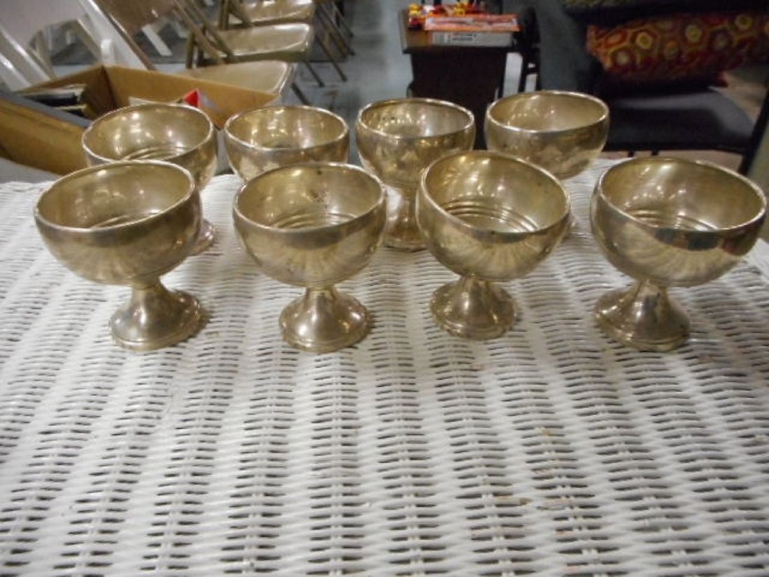 8 Vintage Sterling Silver Wine / water Goblets: 8 Vintage Sterling Silver Wine / water Goblets 8 Vintage Sterling Silver Wine / water Goblets condition need be cleaned as found from estate. one looks a little crooked. marked G H in a shield and a l