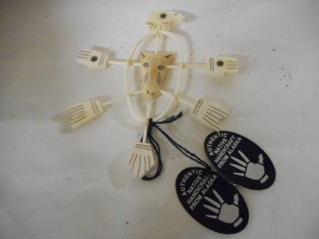 alaskan carving a portrayal of Alaska spiritual creatur: alaskan carving a portrayal of Alaska spiritual creatures alaskan carving a portrayal of Alaska spiritual creatures made from alaskan walrus ivory and walrus bone the carving is a portrayal of bear fi