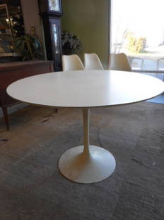 Saarinen Round Dining Table 42" round: Saarinen Round Dining Table 42" round white laminate top condition: good see pics estate found as is very sturdy this is a really good piece original