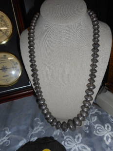 Native American Indian Sterling Silver Navajo necklace: Native American Indian Sterling Silver Navajo Pearls Bead Necklace w/ StampsNative American Indian Sterling Silver Navajo Pearls Bead Necklace w/ Stamps marked sterling with a sun. each pearl is marke