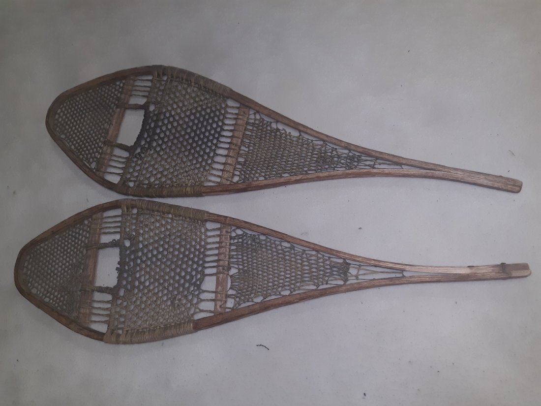 Outstanding! pair of Antique Bentwood Snowshoes: Outstanding! pair of Antique Bentwood Snowshoes and gut string in very good condition copper rivet one has a split part on one ski still attached well see pic 48" long 14" wide at widest point