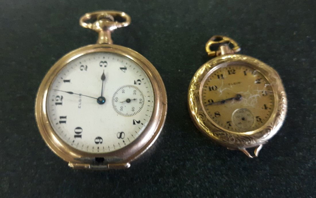 lot of 2 elgin gold filled pocket watches 1917: first one is Gorgeous 14K gold filled elgin 3/0 size grade 417 serial number 19073098 beautiful condition working great! phil watch case 25 year which is there best gold filled case. even the case and