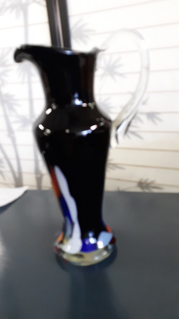 art glass ewer vase by czech republic w/original label: art glass ewer vase by czech republic w/original label this is a large piece 13" tall hand blown beautiful cobalt blue with other colors see pics