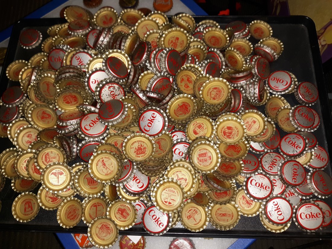 1963 Coke State Bottle Caps 100's: several hundred coke 1963 state bottle caps never used many are near mint some scratched check out the pics huge collection!
