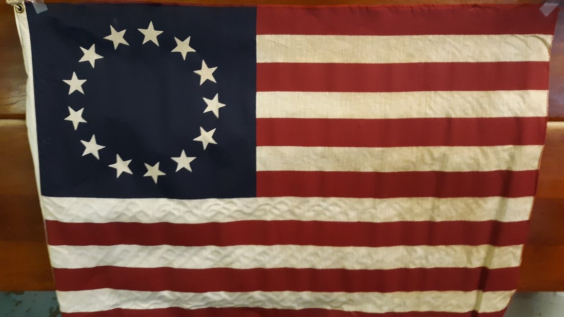 US American Flag 13 Stars: US AMERICAN fLAG 13 STARS no markings looks to be a reproduction has some yellowing definitely not a new piece but how old I do not Know see pics no damage 35" x 24"