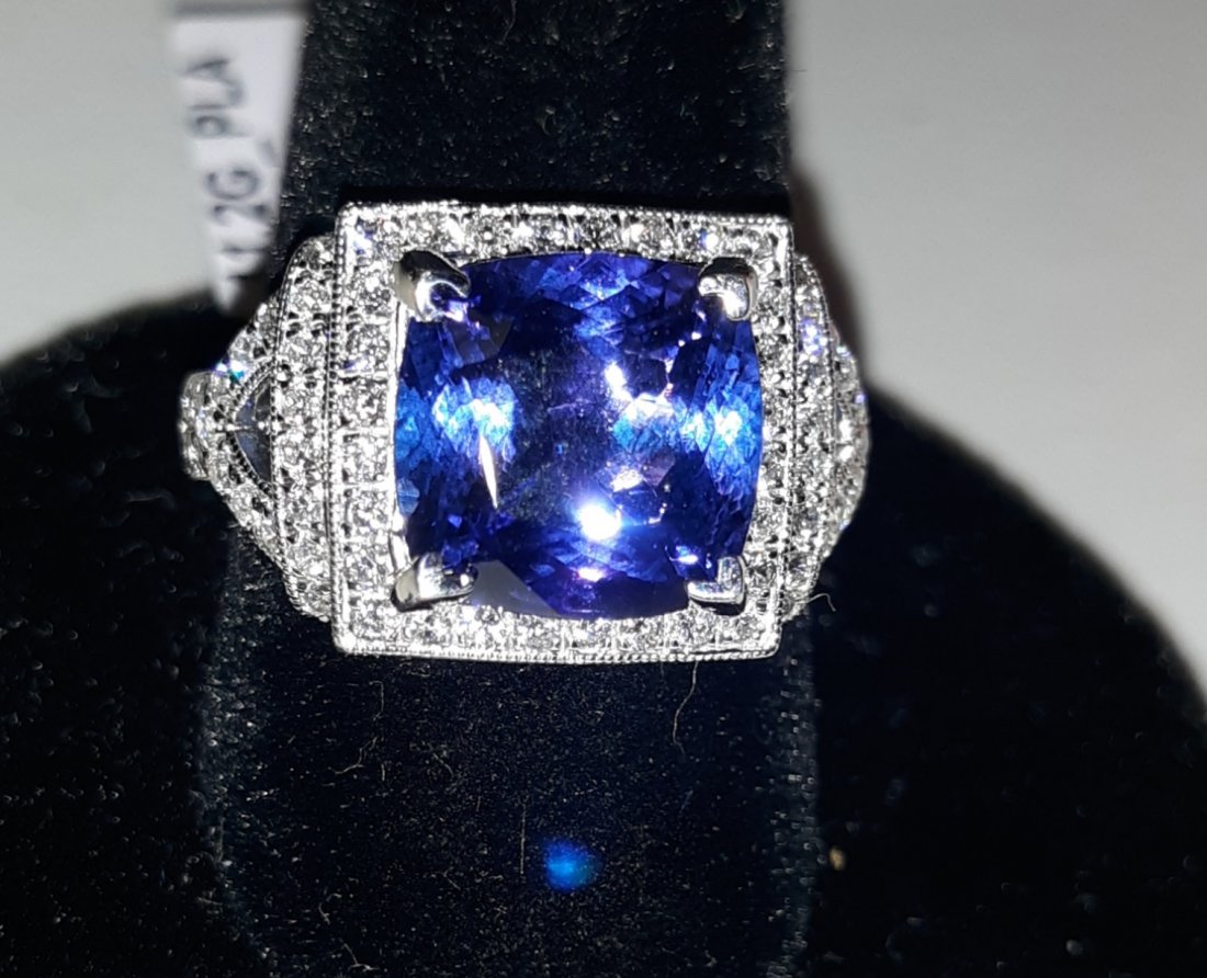 Platinum Tanzanite & Diamond Ring sz 7.25 w/appraisal: stunning platinum ring with 4.79 carat tanzanite medium blue purple! looks like a D Block tanzanite! surrounded by .71 carats of VS/S11 Diamonds incredible ring! $13,780.00 appraisal see pics w/apprai