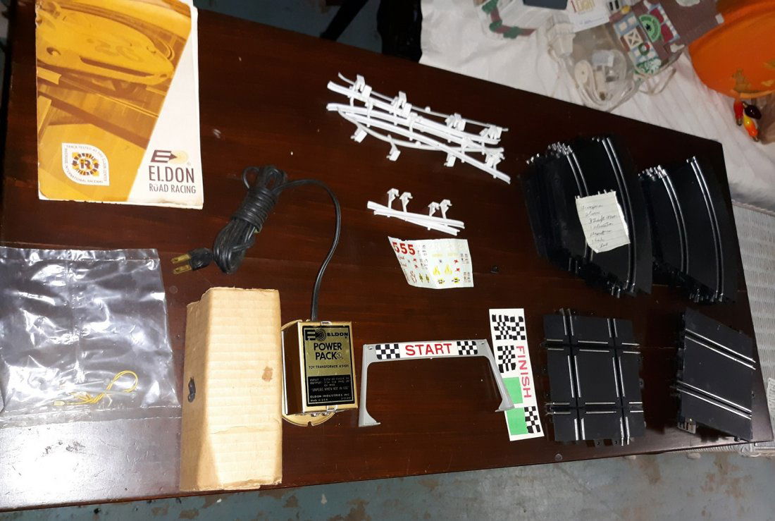 Vintage eldon 1/32nd? Slot car track,transformer,book: includes 1 transformer 12 curves 3 straight 1 intersection 7 rails a start line booklet stickers and 1 power transformer set #9523 no box see pics