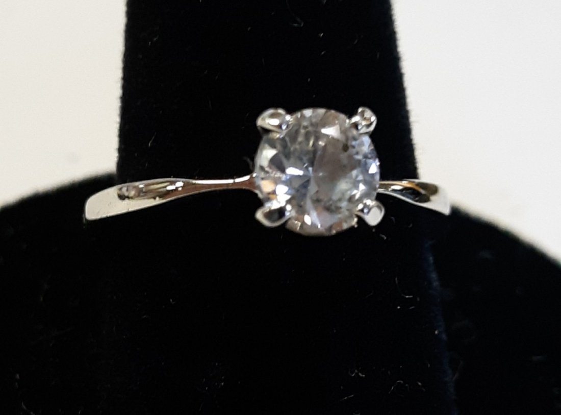 Sterling & 1 carat CZ Ring vintage 7 1/2": beautiful sterling ring vintage 70's avon w/ 1 carat CZ size 7 1/2" see pics
