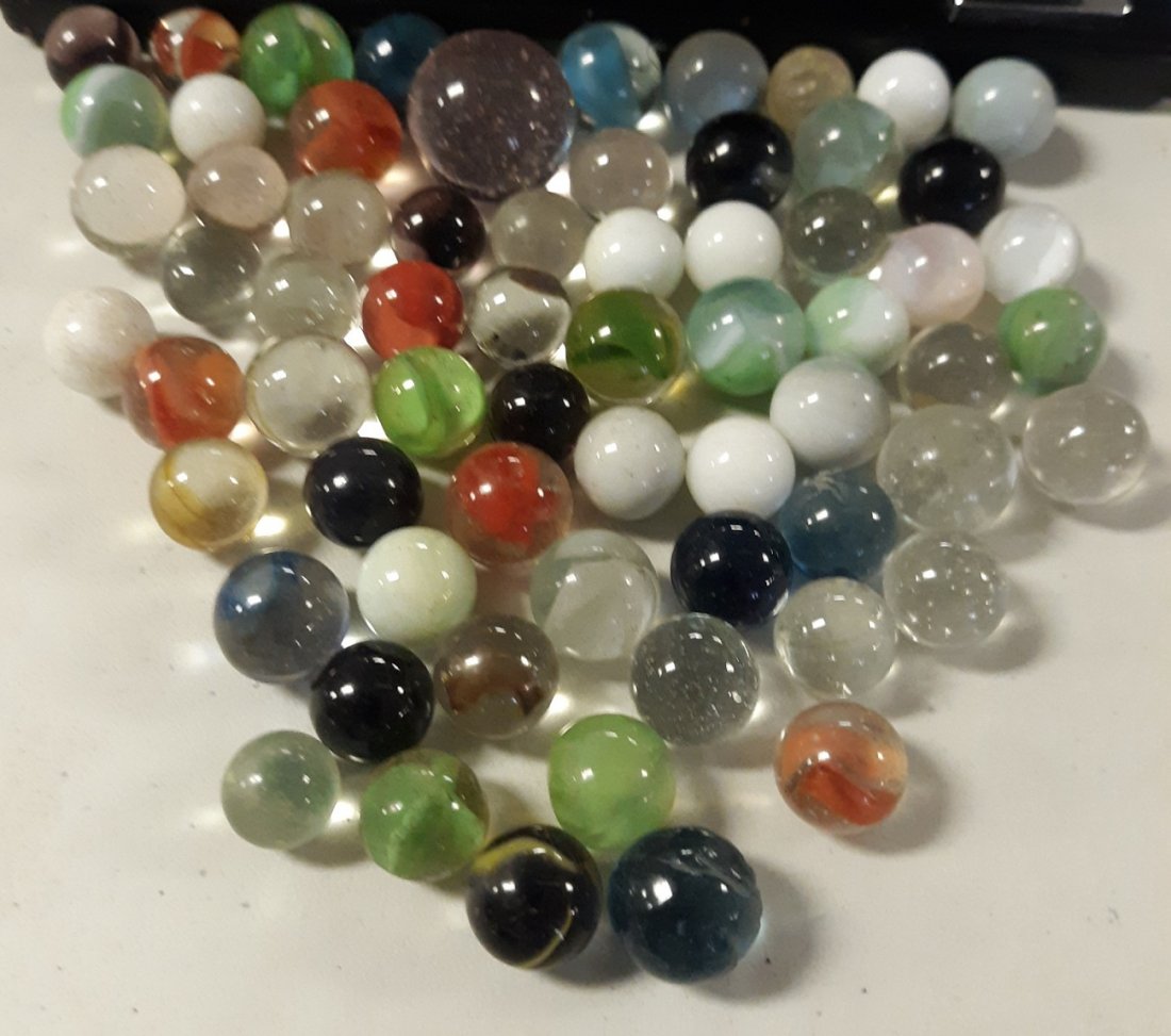 Huge Vintage estate Marbles lot of 65 mostly hand made: last lot of the advanced estate marble collection. 65 marbles with a shooter mostly hand made in varying sizes from less than 1/2" -7/8" purple glass shooter see pics