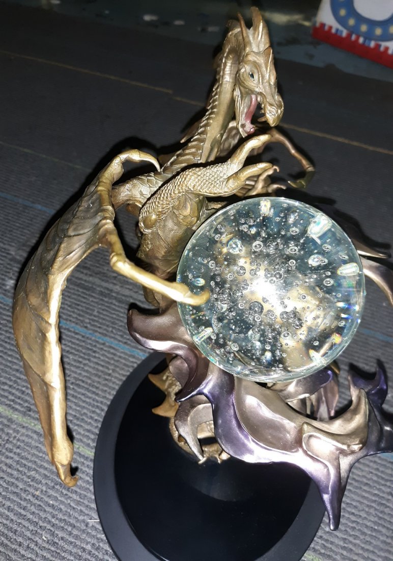 Franklin Mint "Dragon of Power” sculpture BY JULIE BELL: Franklin Mint "Dragon of Power” sculpture. This sculpture is approximately 11-3/4 inches tall including the base and 9 1/2" wide BRONZE DIE-CAST SCULPTURE DRAGON. . The sculpture was created by Juli