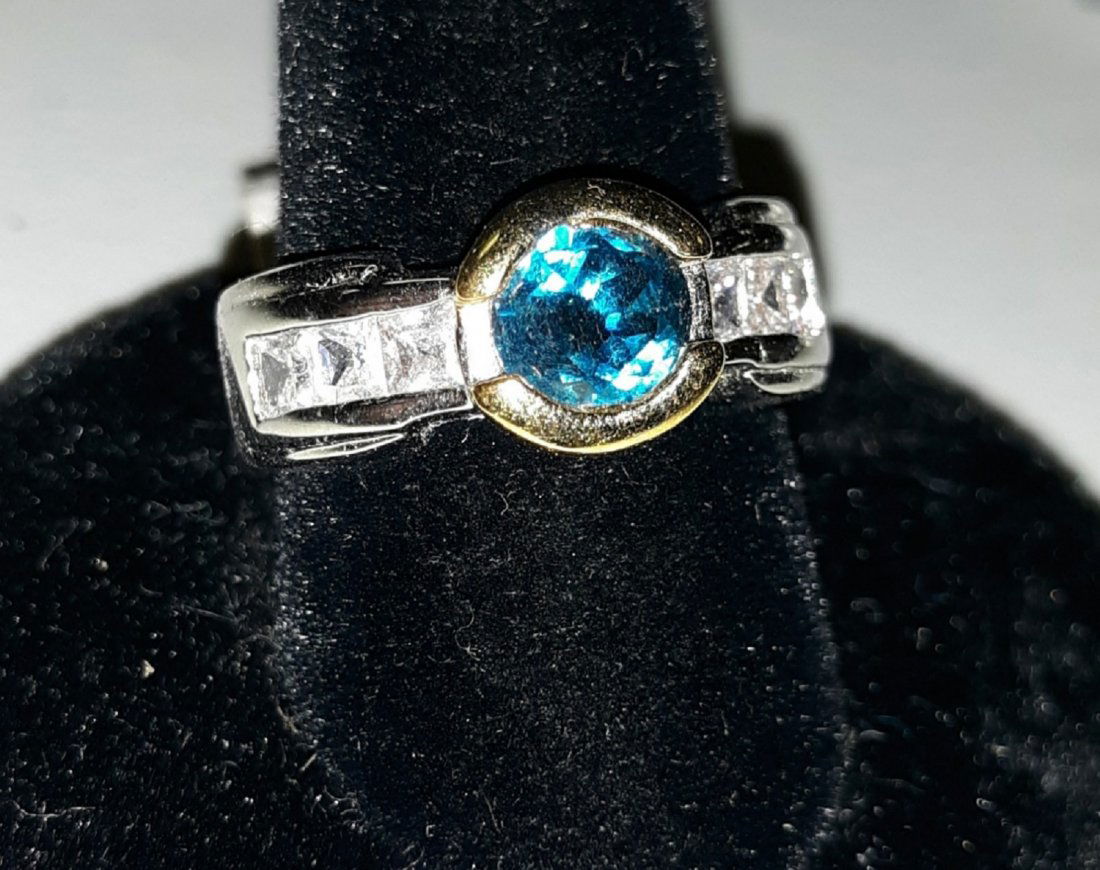 vintage 14k hge CZ ring sz 6: beautiful vintage white and yellow gold heavy gold electroplate with 1 carat center blue cz and 6 square cut cz's on the side gorgeous vintage 80's? era ring see pics