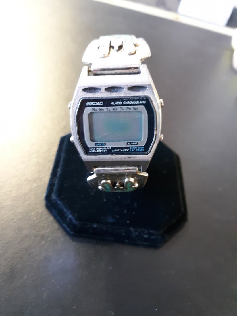vtg Seiko alarm chrono watch A257-5000 turquoise band: vintage estate watch Seiko alarm chronograph marked a257-5000 case back a257-5009 has band with turquoise and red coral band appears to be base metal w/some corrosion not working needs battery? check 