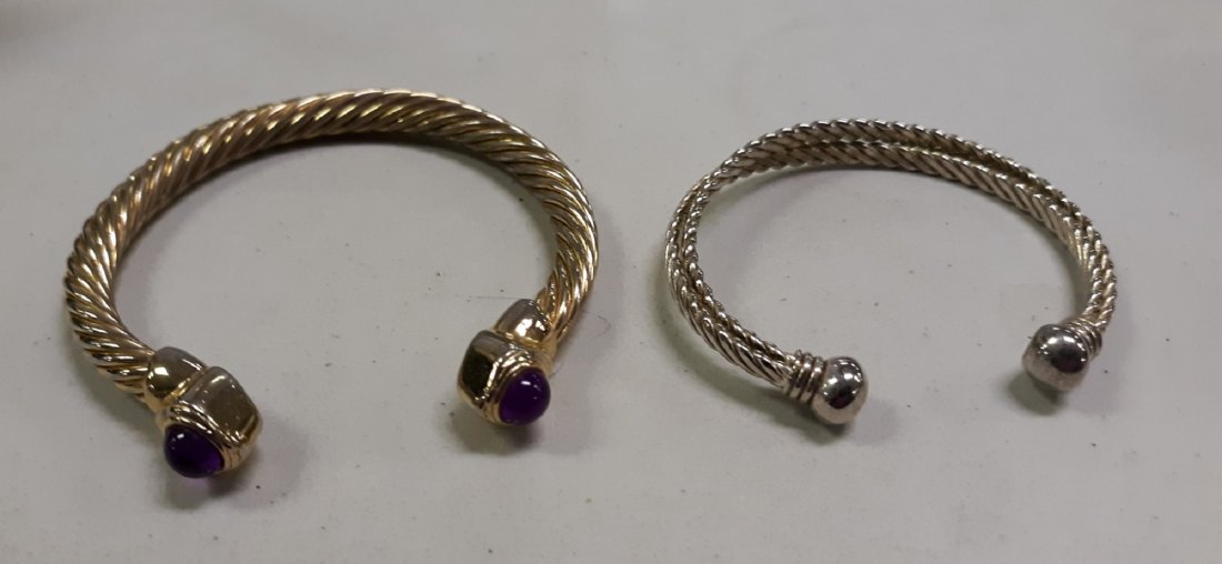 estate bangle bracelets Yurman style purple stone: 2 beautiful estate bracelets in david yurman style one is gold tone w purple stone? accents other is silver no marking both in very good condition see pics