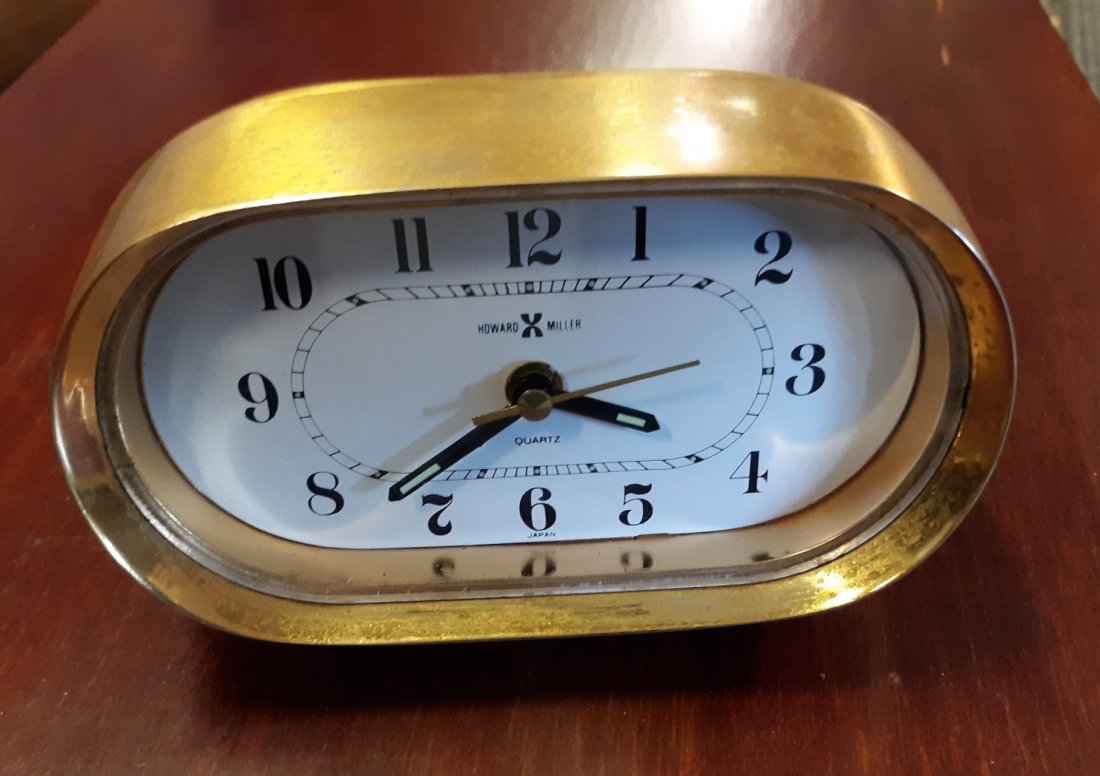 mid century Howard miller norfolk bedside alarm clock: beautiful 1960's howard miller bedside or desk alarm clock working great in good condition has orig tag inside cost back then $65.00 around $350 to 400 today! 4 1/2" long see pics soo cool! see pics