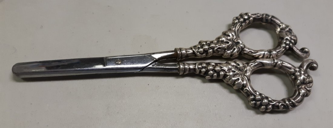 vintage J.A Henckels welcut sterling scissors grape wor: beautiful sterling scissors by Ja henckels grape and vine pattern in very good condition cuts paper vey smooth too! 7" 70 grams